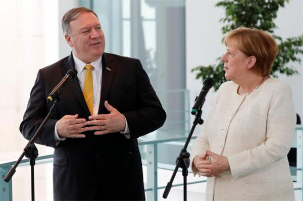 Помпео та Меркель обговорили Україну, протидію агресії Росії